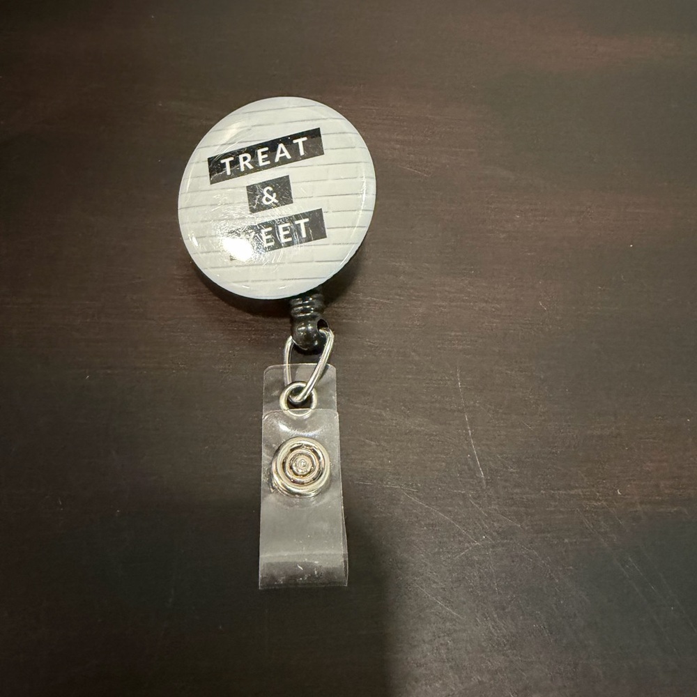 Round Badge Reel with 'Treat & Yeet' Design